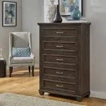 Branson 5 Drawer Chest in bedroom with sleek design and spacious storage.